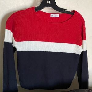 Sweatshirt with ribbing at neckline cuffs,and hem.soft,brushed inside.